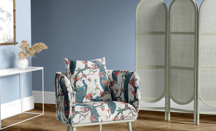 Luxury upholstery fabrics for chairs, available in elegant textures and patterns.