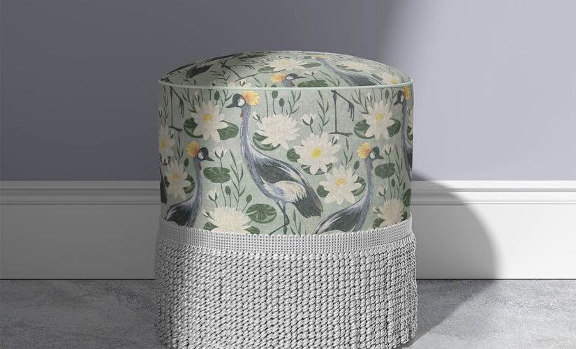 Bird-themed upholstery fabrics featuring nature-inspired prints and woodland scenes.