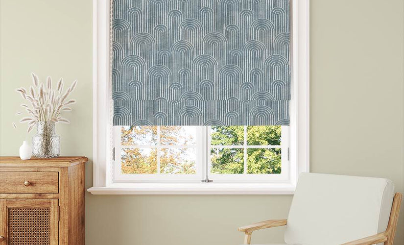 Azure blind fabric styled as a patterned roman blind in a bright modern living room