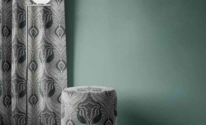 Grey upholstery fabrics in dove, taupe and charcoal tones for sofas and chairs.