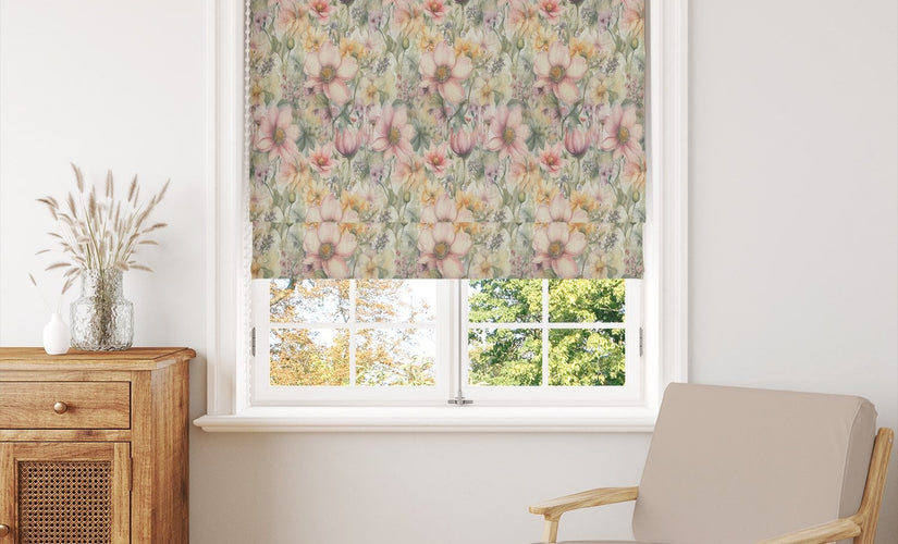 Blush pink printed blind fabric in floral design fitted as a Roman blind