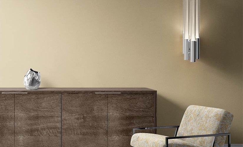 Leaf-patterned upholstery fabrics in natural tones for sofas, chairs and cushions.