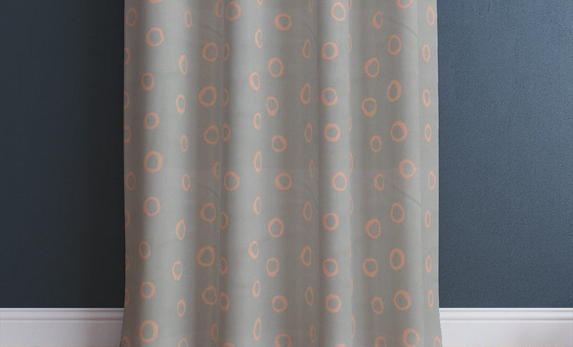 Close-up of grey patterned curtain with heading tape finish