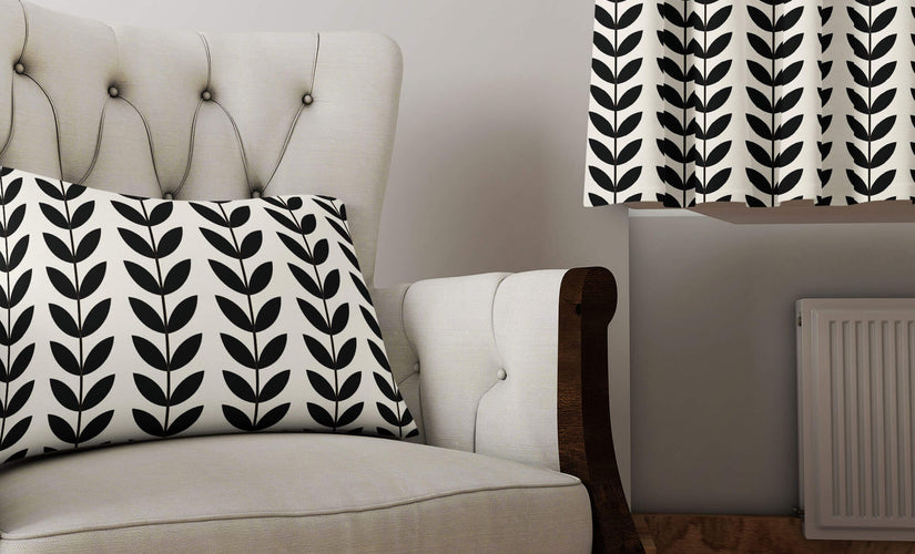 Black and white curtain fabric sample with graphic modern prints, displayed in high-contrast style