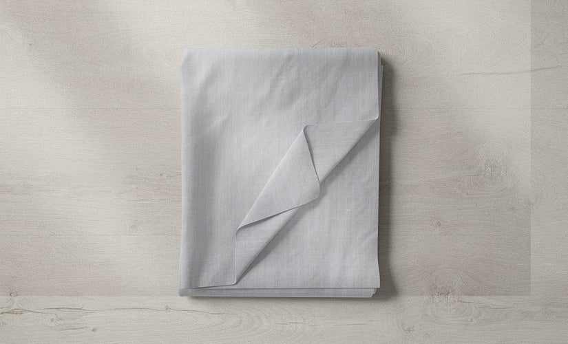 Assorted white and cream fabrics suitable for curtains and upholstery.