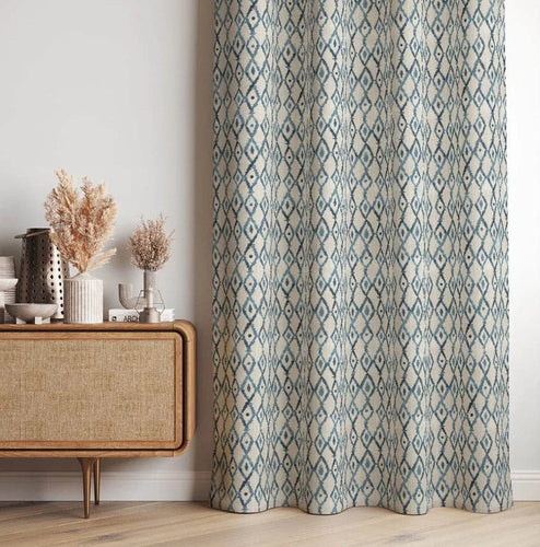 Aegean blue linen curtain fabric styled in a calm, coastal room