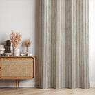 Albany Stripe Upholstery Fabric in blue, green, and cream colors, perfect for adding a stylish and contemporary touch to any furniture piece or home decor project