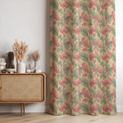 Alston Linen Curtain Fabric with pink and green leaf pattern – roomset image