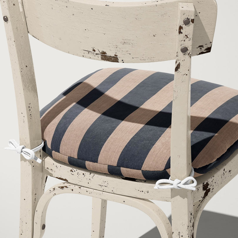 Cushion in Altena Navy upholstery fabric – deep blue stripe on natural linen-style background