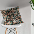 Amur leopard print fabric cushion showing decorative animal print design