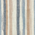 Flat lay of Austin Stripe linen curtain fabric in denim and natural tones