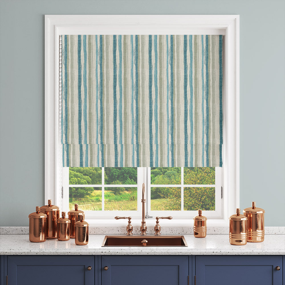 Teal striped linen curtain fabric styled for a window blind