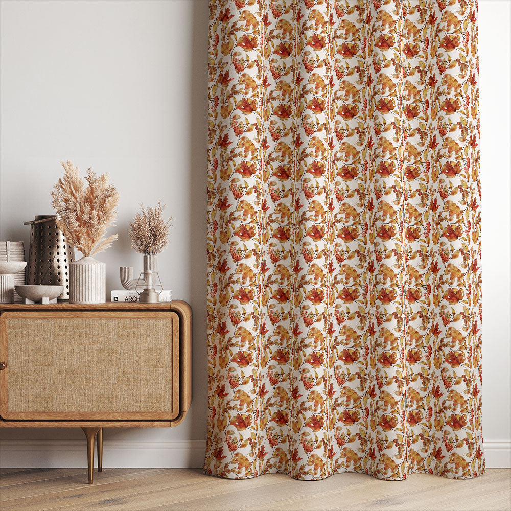 Autumn Leaf Golden polyester fabric shown as full-length curtains with warm orange and ochre foliage