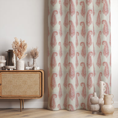 Baku Paisley Linen curtain fabric in henna red, styled as elegant draped curtains in a modern interior