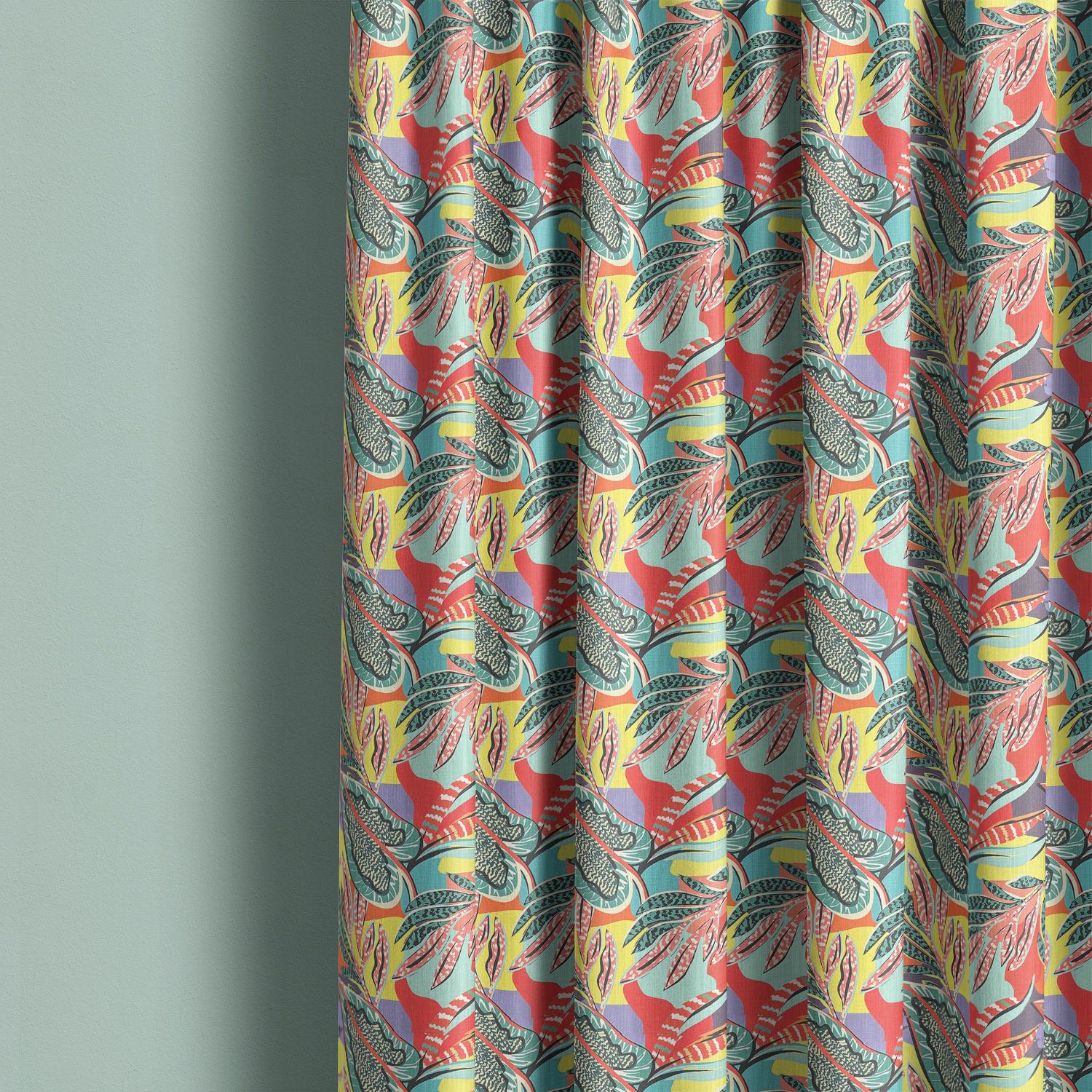 bold leaf curtain fabric hanging as curtains with vibrant tropical leaf pattern on linen curtain fabric