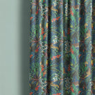 animal curtain fabric with vibrant rainforest design featuring leopards and tropical foliage used as curtains