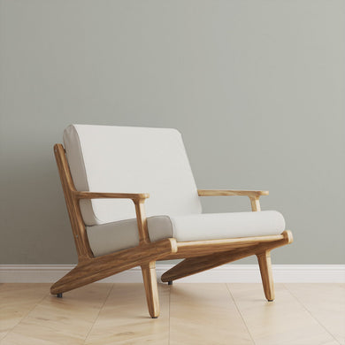 Boughton Plain White durable upholstery fabric covering a modern wooden armchair