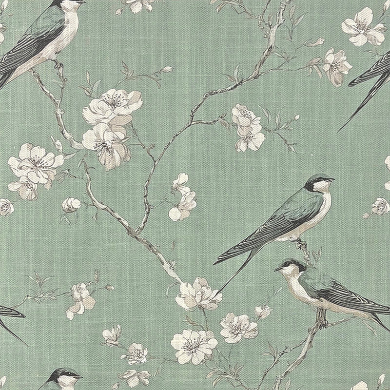 Bourton linen curtain fabric close up showing bird pattern on green linen basecloth