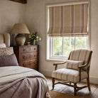 Braemar Stripe Upholstery Fabric in Plum roomset with patterned stripe fabric