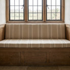 Braemar Stripe Upholstery Fabric in Putty on upholstered bench