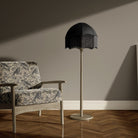 Brewood bird style upholstery fabric upholstered on accent chair in neutral interior setting