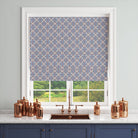     curtain fabric with blue mediterranean pattern used as roman blind in kitchen setting