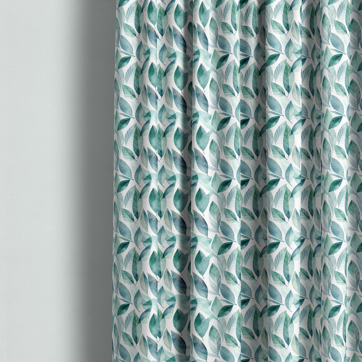 Cannock washable teal leaf fabric shown as full-length curtains in a calm contemporary room