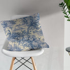 Colmar blue French toile fabric styled as a decorative cushion in a classic interior