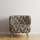 Cortona cow print upholstery fabric upholstered accent chair in modern interior