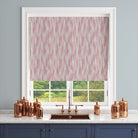 Roman blind made from Dallas Pink striped curtain fabric in a kitchen setting, featuring warm pink broken stripes.