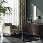 Roomset showing Deco Leaf Golden linen curtain fabric on armchair and curtains in elegant modern room