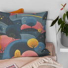 Dovedale tree pattern cotton curtain fabric styled as cushion – navy and pink decorative curtain fabric with illustrated trees