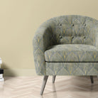 Feathercrest Fossil fire retardant upholstery velvet shown on chair in soft neutral tones