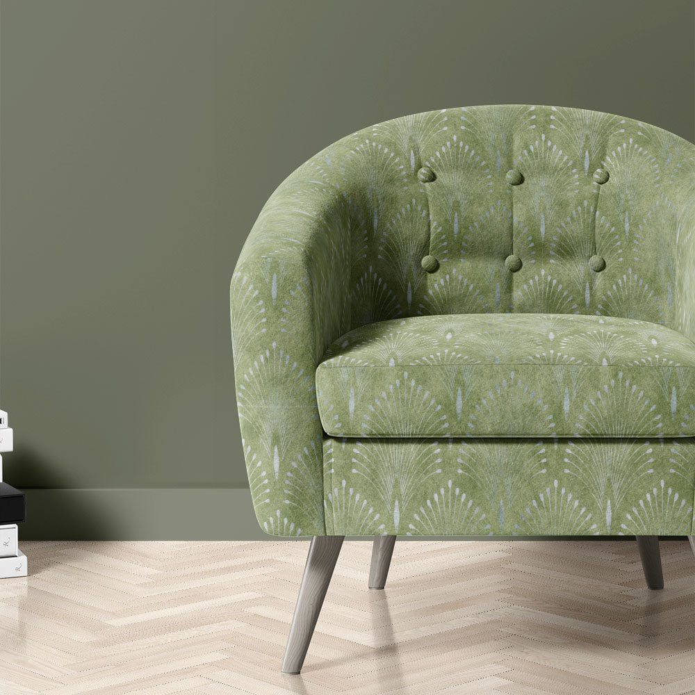 Feathercrest Willow fire retardant velvet upholstery fabric shown on chair with green fan pattern