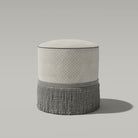     dark upholstered stool in noir feathered plume upholstery fabric with structured art deco pattern