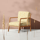 Mimosa Feuille patterned velvet on an upholstered chair for Arts and Crafts interiors