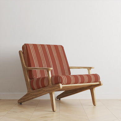 Foxwolde Striped Upholstery Fabric in Henna – henna red stripe fabric on modern wooden chair