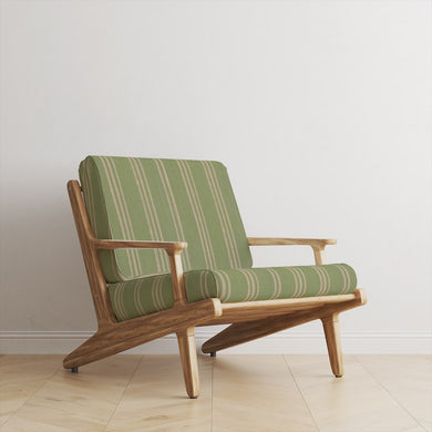 Foxwolde Striped Upholstery Fabric in Lemongrass – pale green stripe fabric upholstered on chair