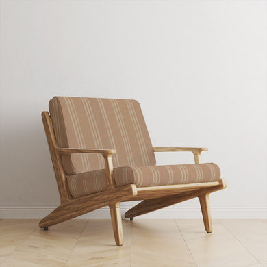 Foxwolde Striped Upholstery Fabric in Natural – natural-toned striped fabric on retro armchair