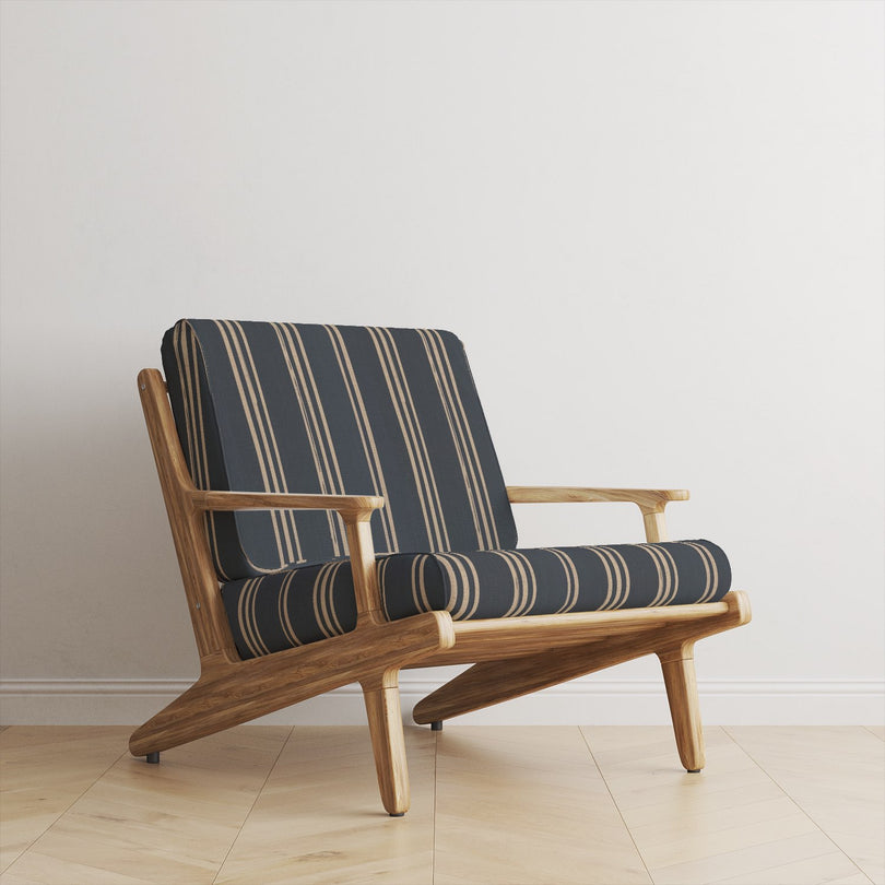 Foxwolde Striped Upholstery Fabric in Navy – navy striped fabric styled on wooden chair