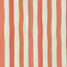 Flat lay image of Fremont Peach striped curtain fabric with soft coral, peach, and linen tones.