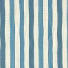 Flat lay image of Fremont Teal striped curtain fabric with teal green, ivory, and natural stripes.