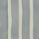 Flat image of Fresno Stripe Ice linen curtain fabric with soft blue and off-white painterly vertical stripes