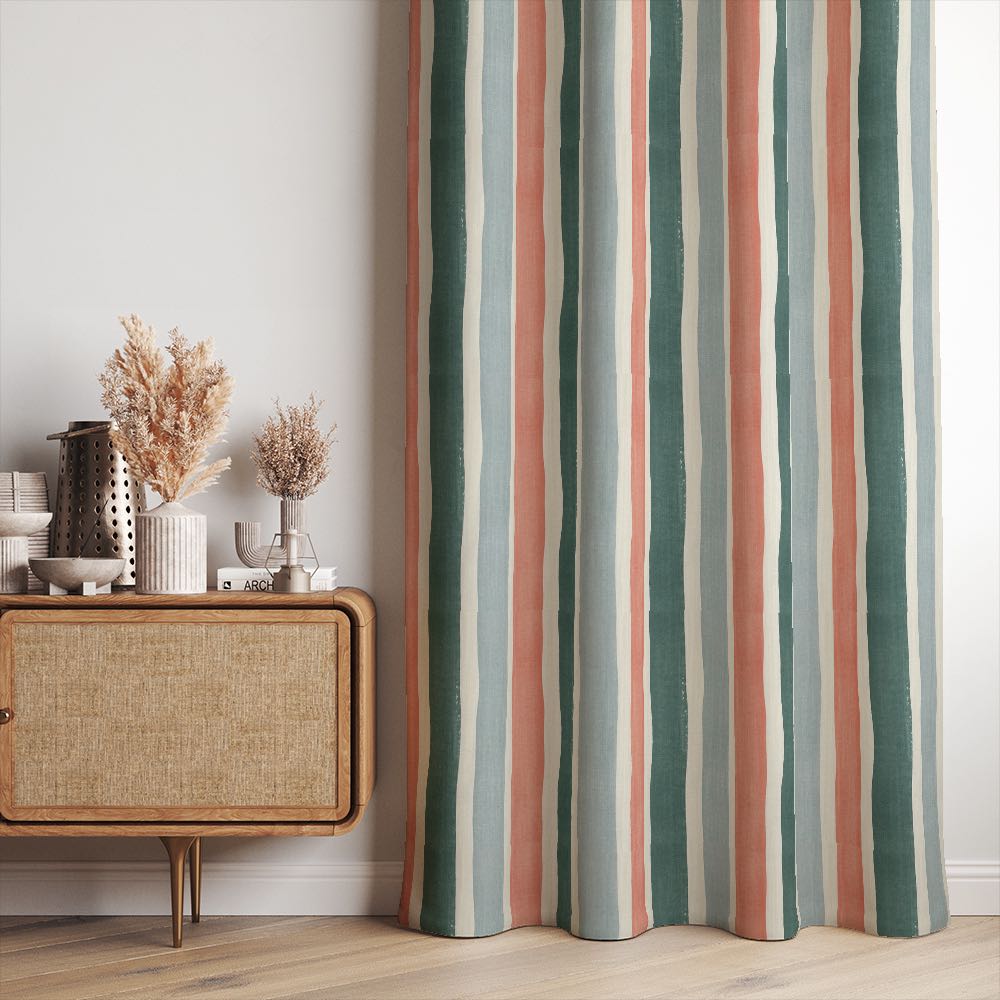Fresno Stripe Multi linen curtain fabric made into curtains with coral, teal, and soft blue stripes for a vibrant living space