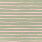 Lemongrass striped upholstery fabric with a soft yellow-green tone, ideal for modern and traditional upholstered furniture.