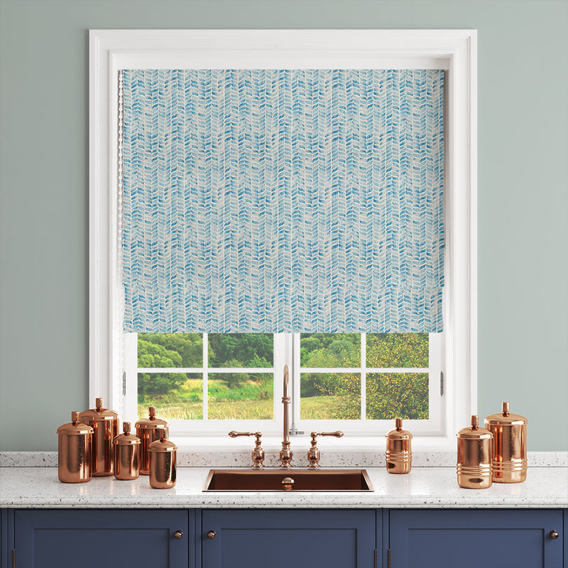 Garston Blue Blind — Linen curtain fabric with blue chevron brushstroke pattern in kitchen setting