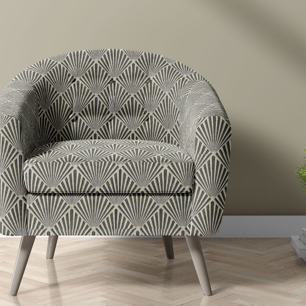 bold upholstery fabric in art deco fan design upholstered on statement armchair