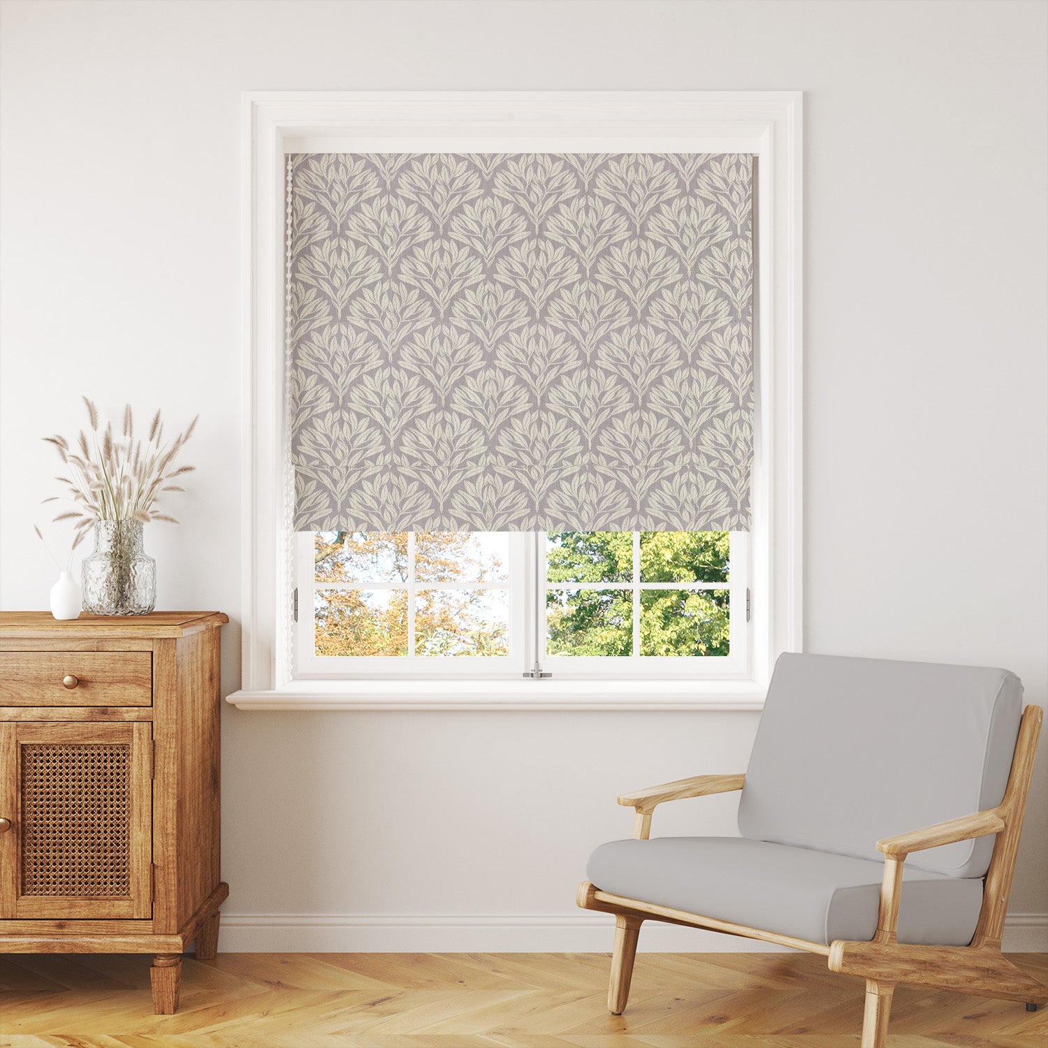 Harewood Leaf Linen curtain fabric in dove grey, styled as a window blind for a classic and natural interior look.