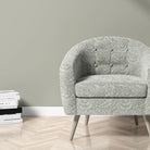 Chair upholstered in Harlestone Laurel Green velvet – leafy printed upholstery fabric