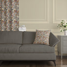 Harrogate floral curtain fabric – styled curtains and cushion in traditional living room interior